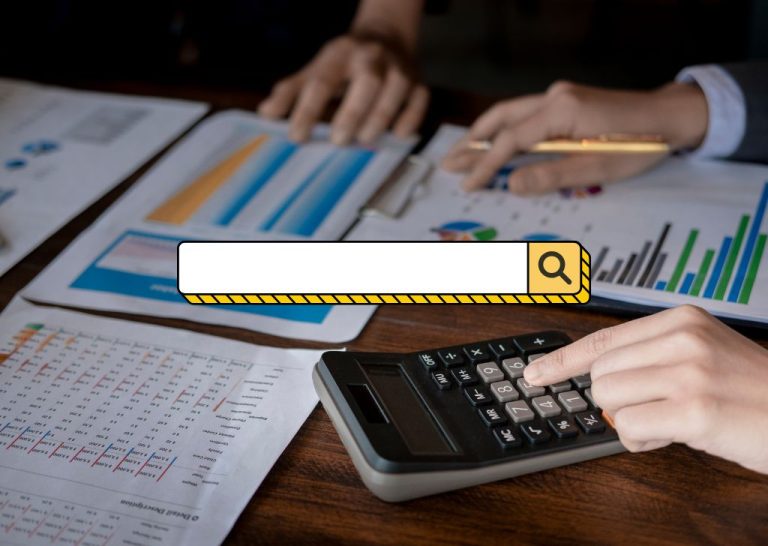 A close-up of hands using a calculator with financial reports and graphs, representing budgeting and expense management.